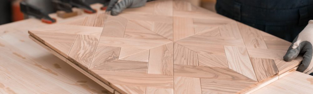 Geometric mosaic wood flooring production. Premium handcrafted Wooden floor Production