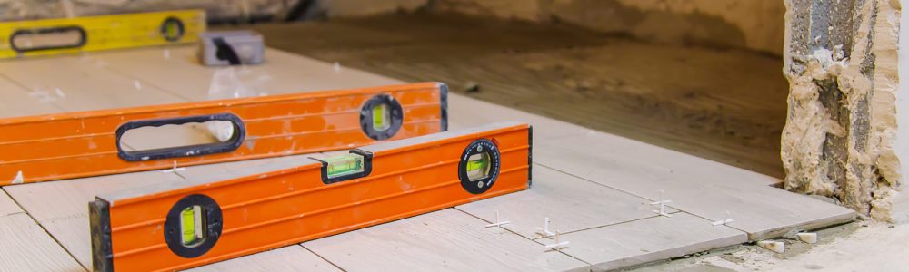 measure tile repair in the house. Selective focus. white.